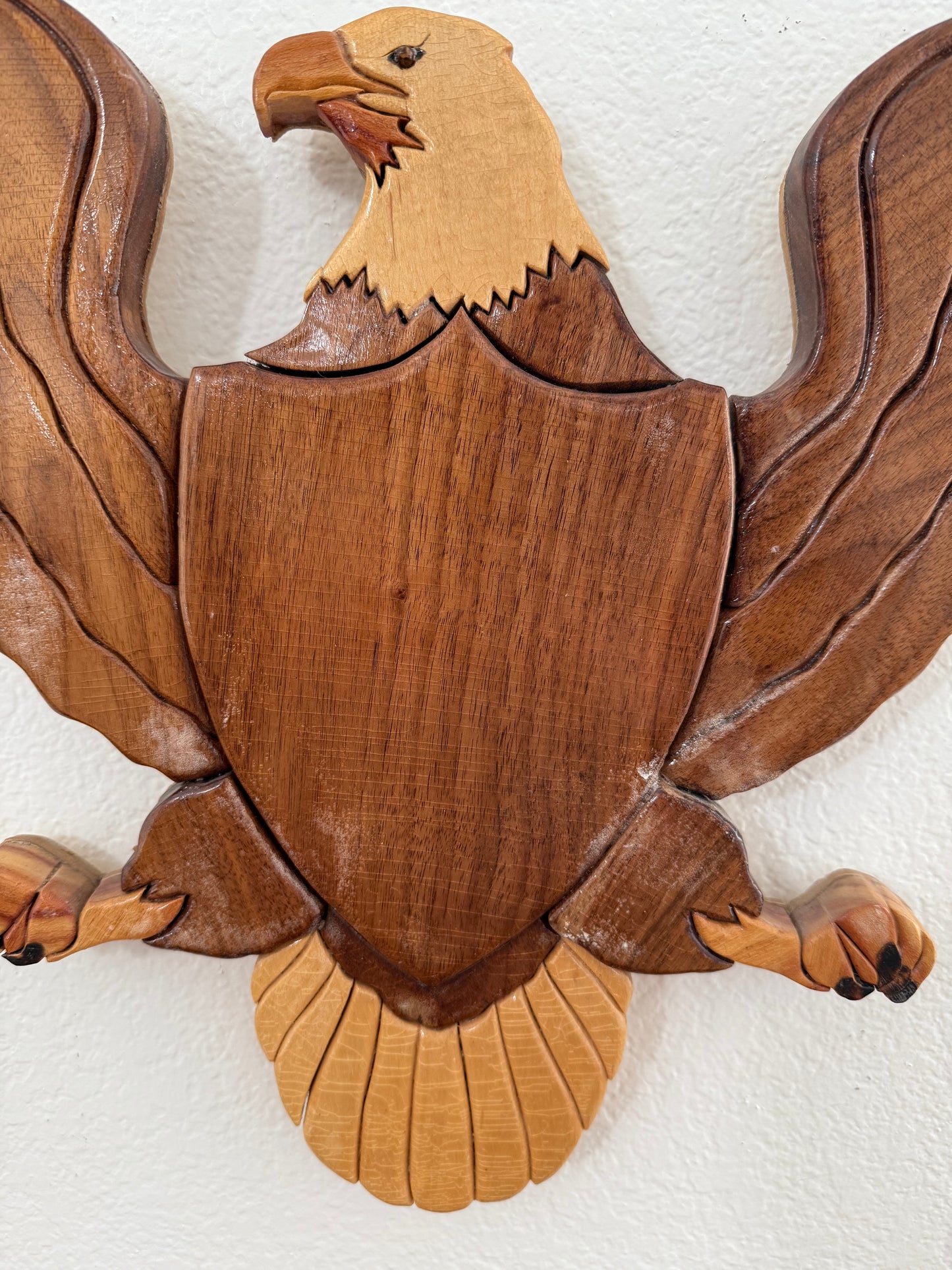 Wooden eagle on a white background