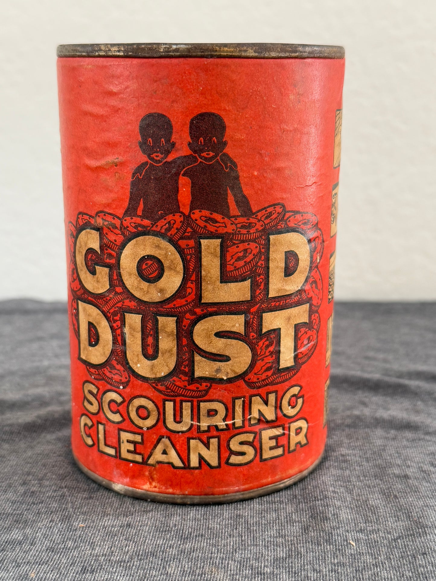 Vintage Gold Dust Scouring Cleanser can on a gray surface