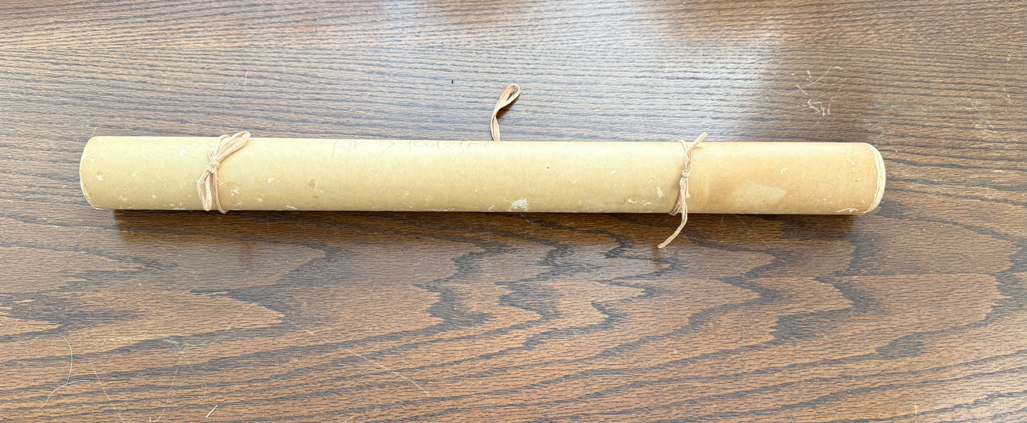 Rolled-up paper on a wooden surface