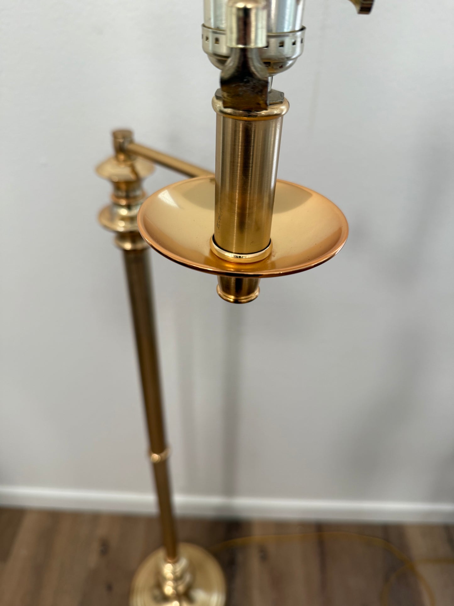 Close-up of a gold lamp with a white background