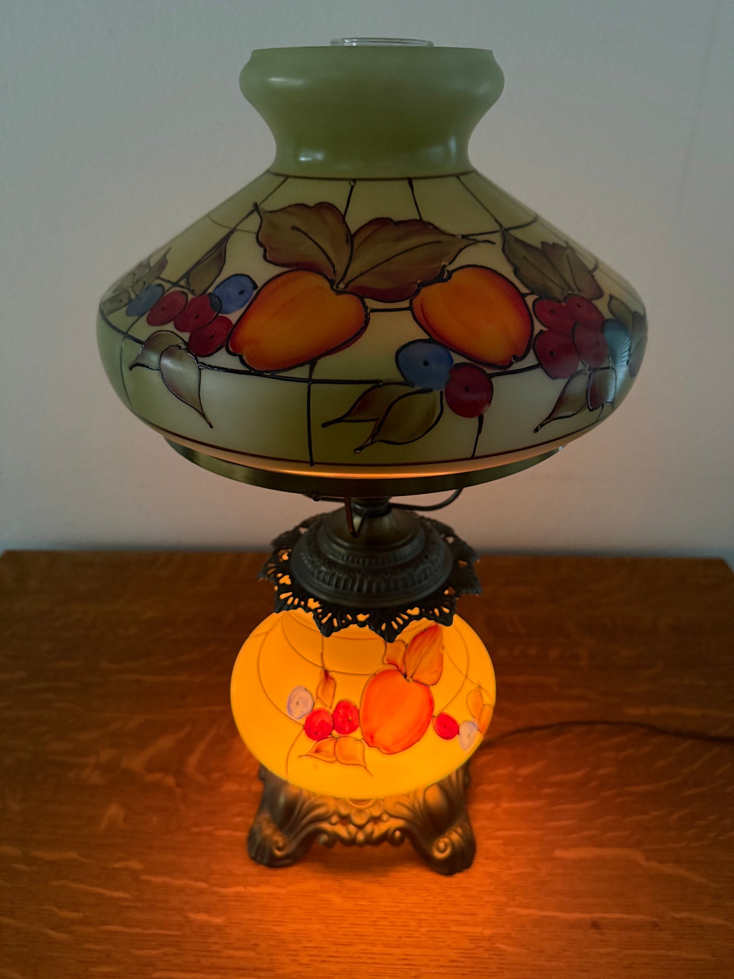 Decorative lamp with stained glass design on a white background