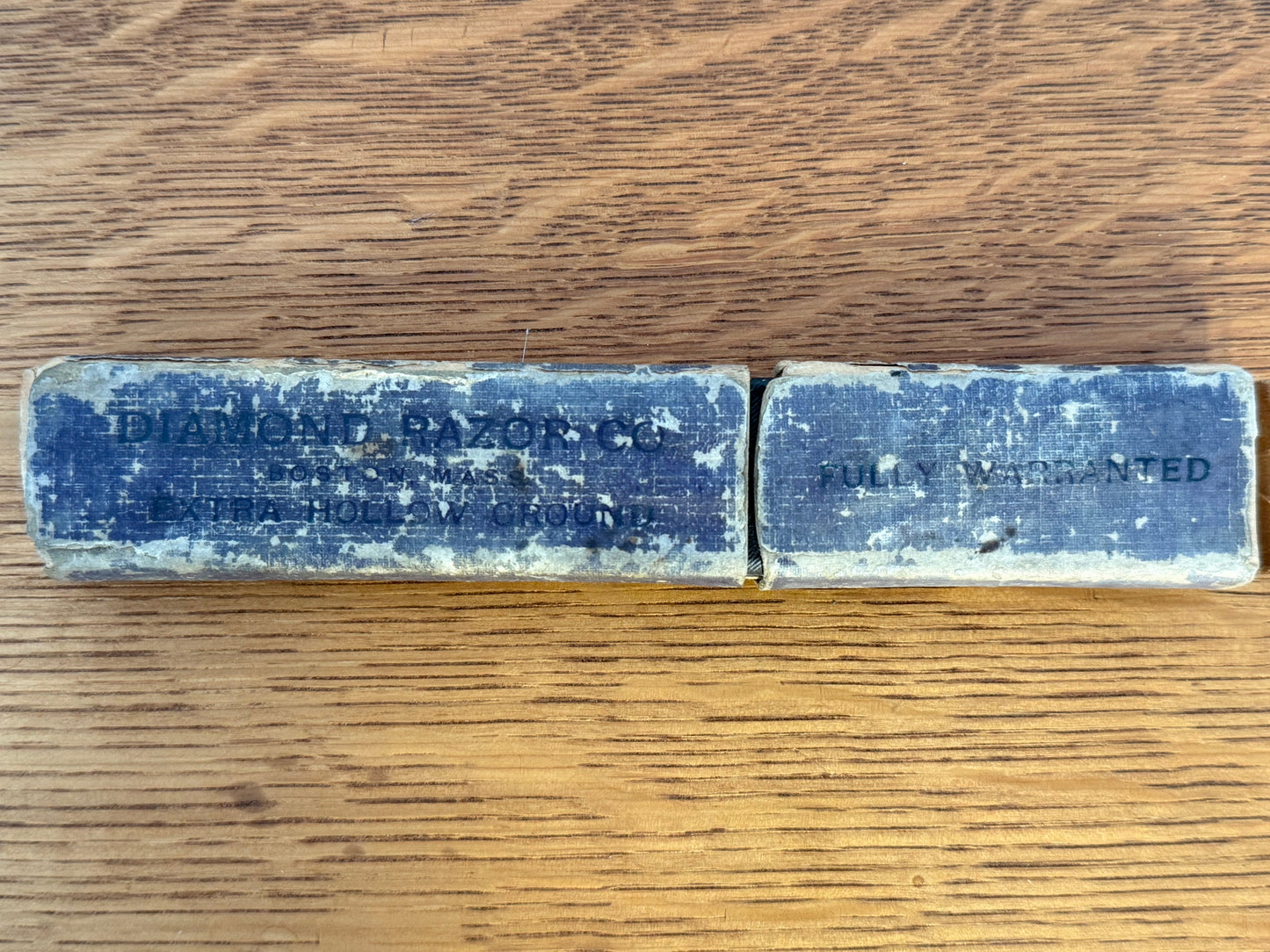 diamond razor box on a wooden surface
