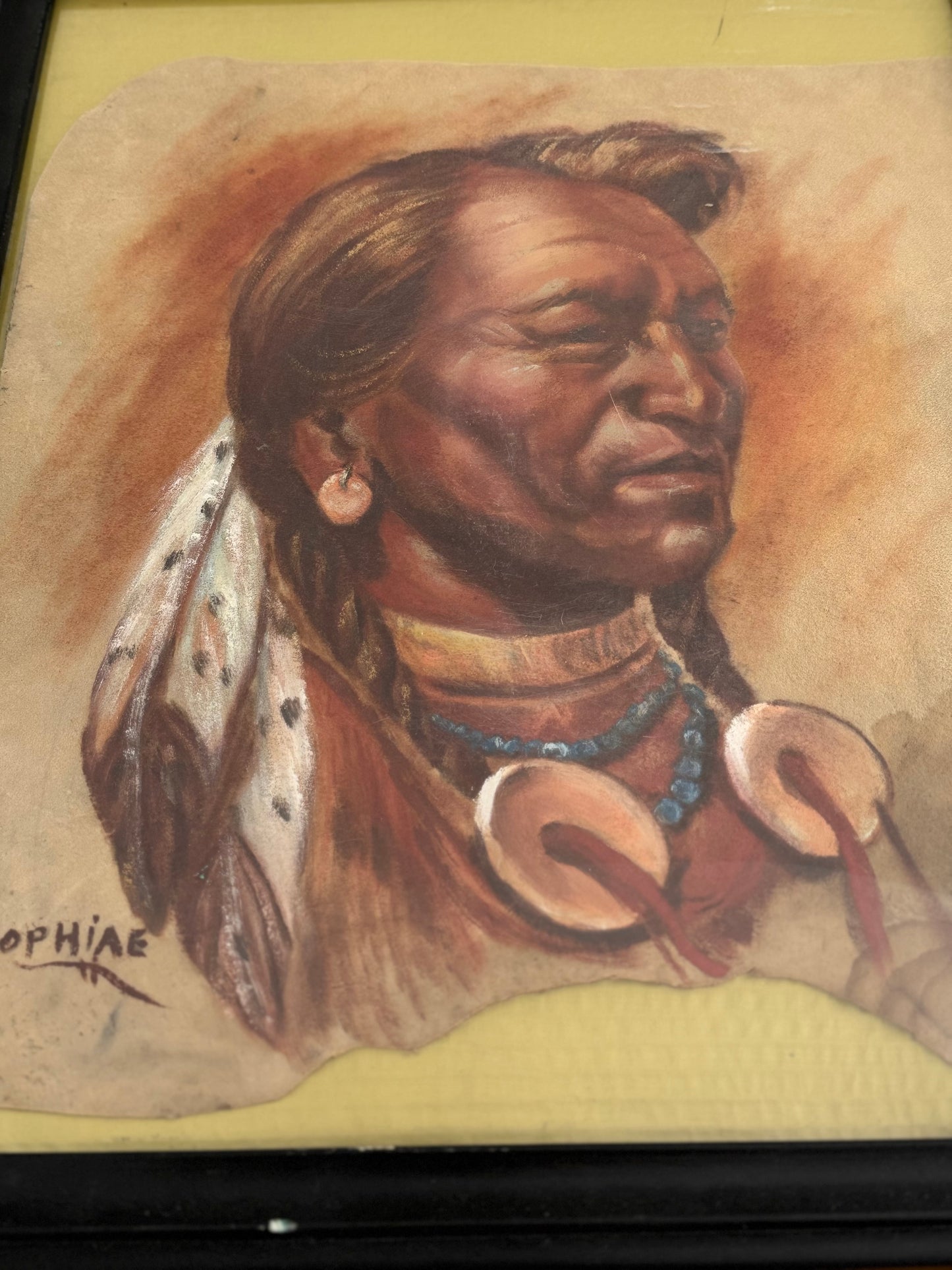 Artistic depiction of a Native American figure with headdress and jewelry on a textured background.
