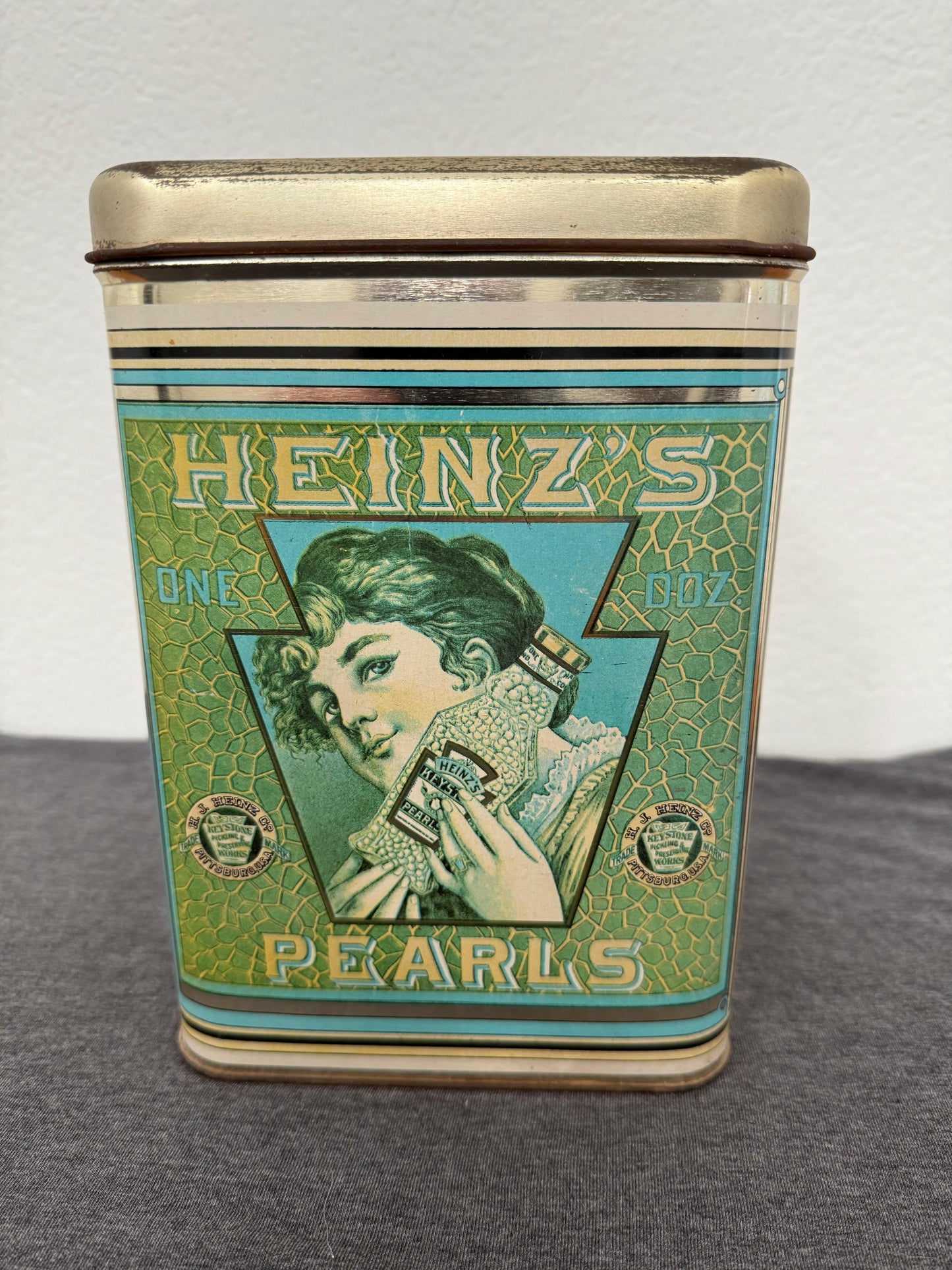 Vintage Heinz Pearls can on a gray background