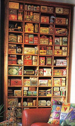 Shelf full of vintage tins