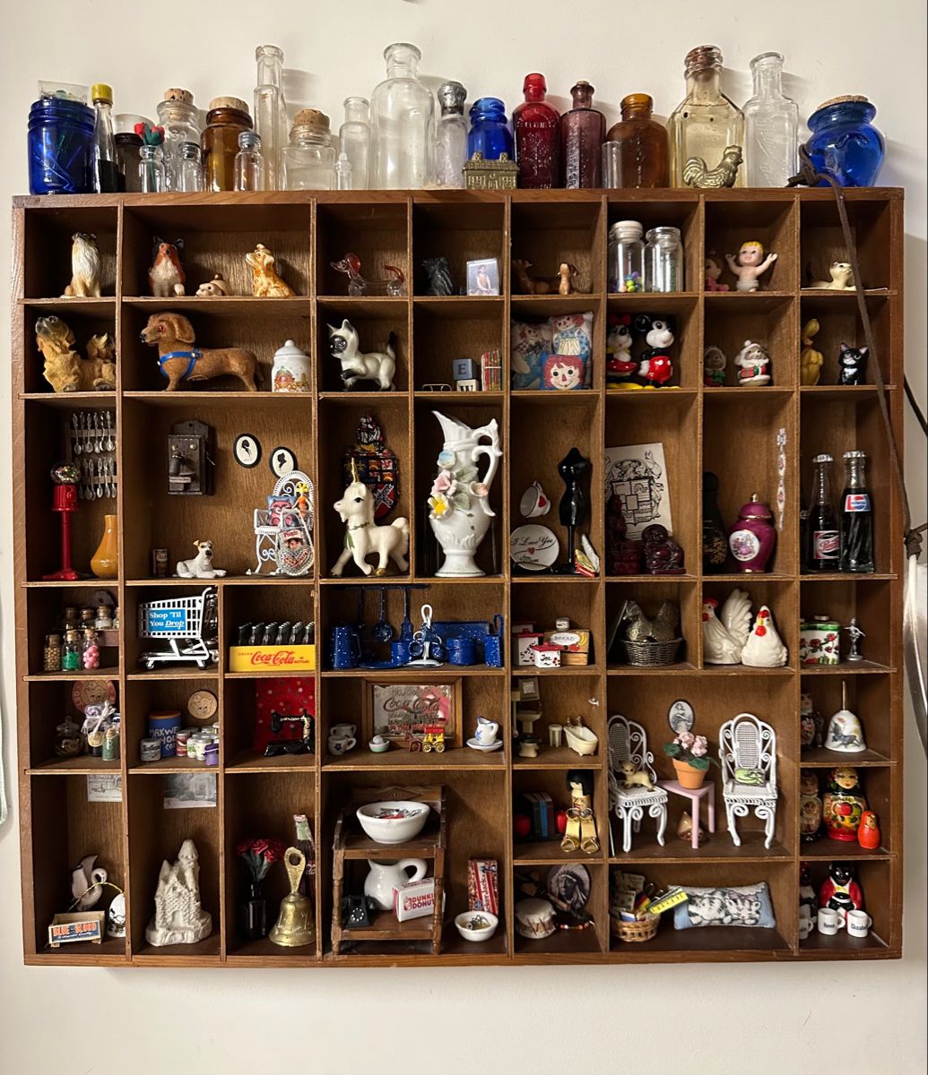 Shelf full of trinkets and collectibles