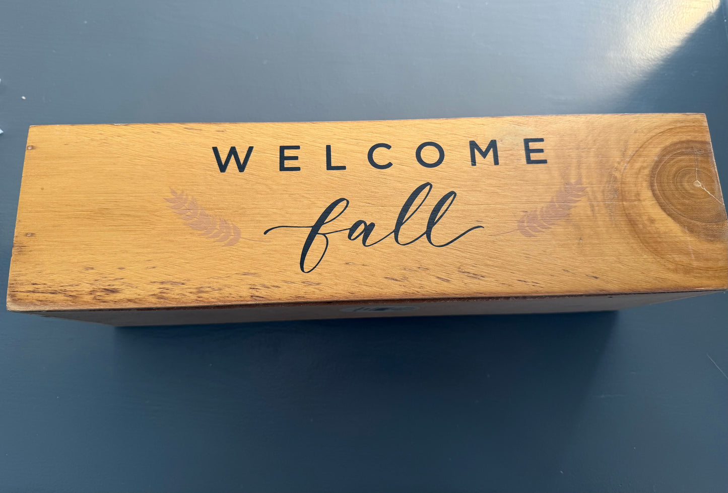 Wooden Crate with Painted “Welcome Fall” Lettering