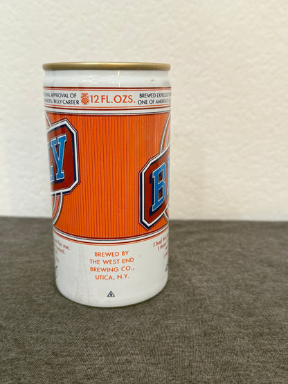 Beer can with a visible brand logo on a textured surface