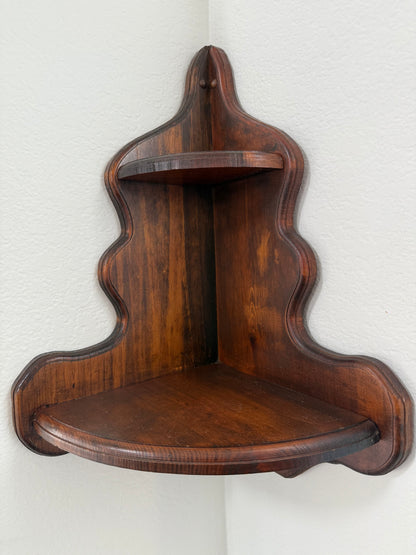 Wooden shelf with wavy edges on a white background
