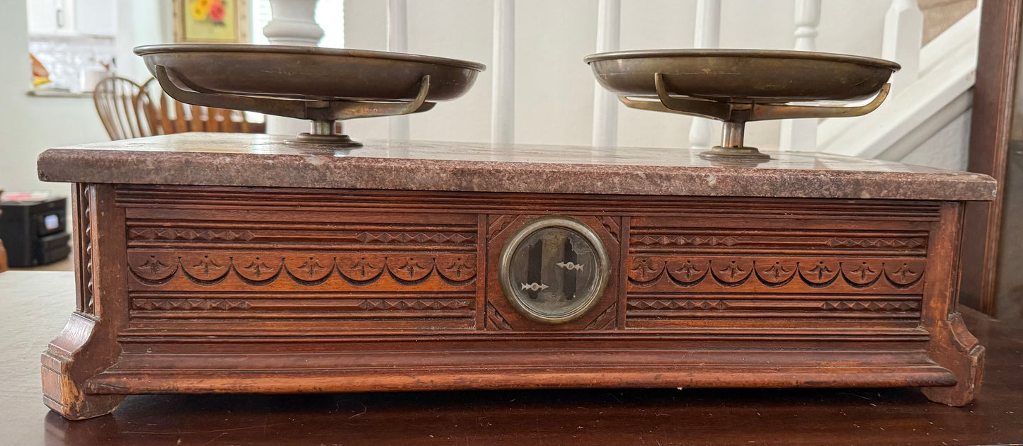 Vintage wooden scale with marble top and decorative details