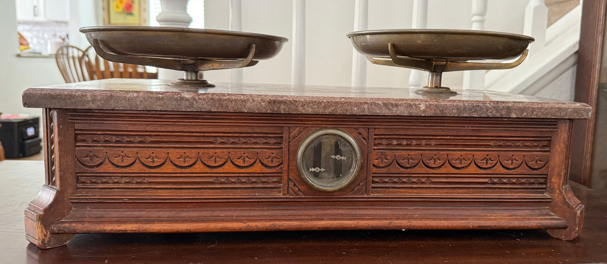 Vintage wooden scale with marble top and decorative details