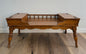 Wooden coffee table against a plain wall