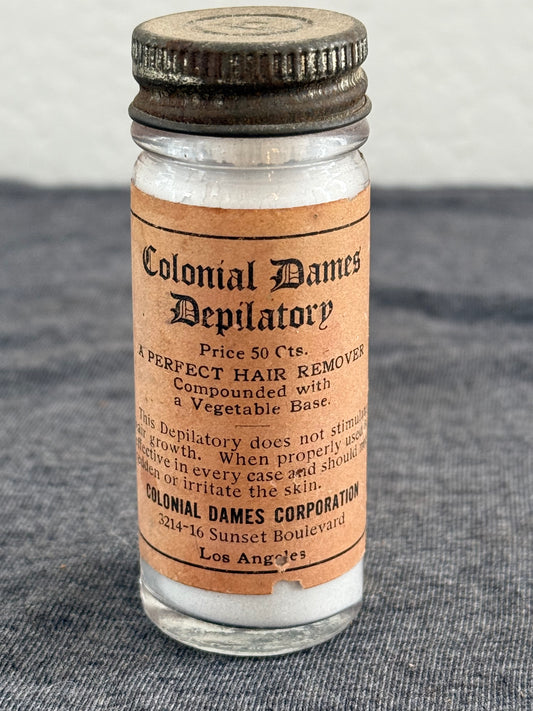 Vintage Colonial Dames Depilator on a gray background