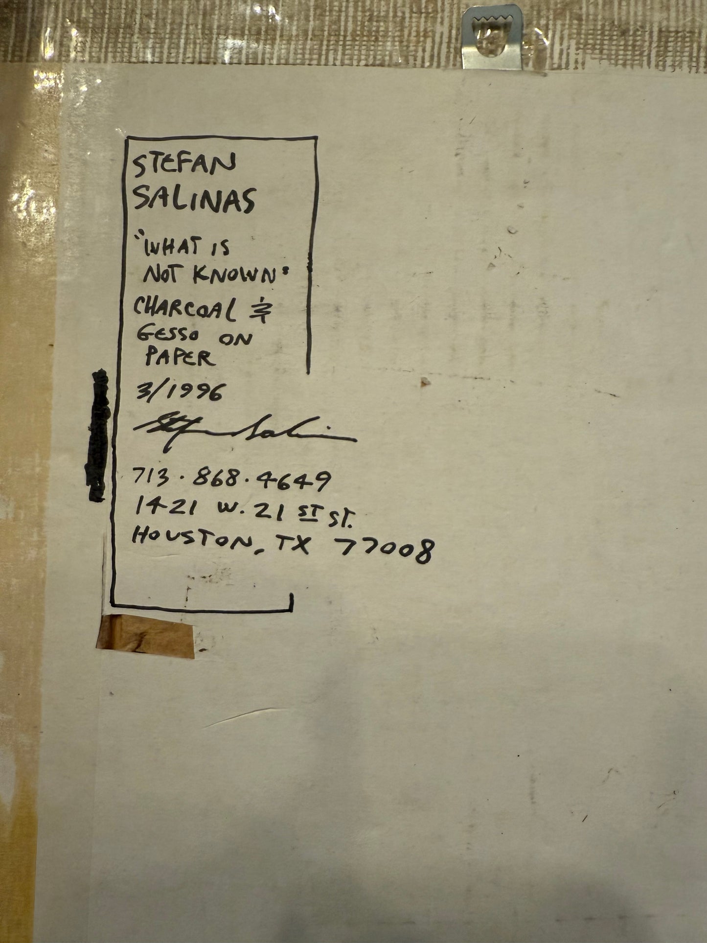 Artwork with text on a textured surface