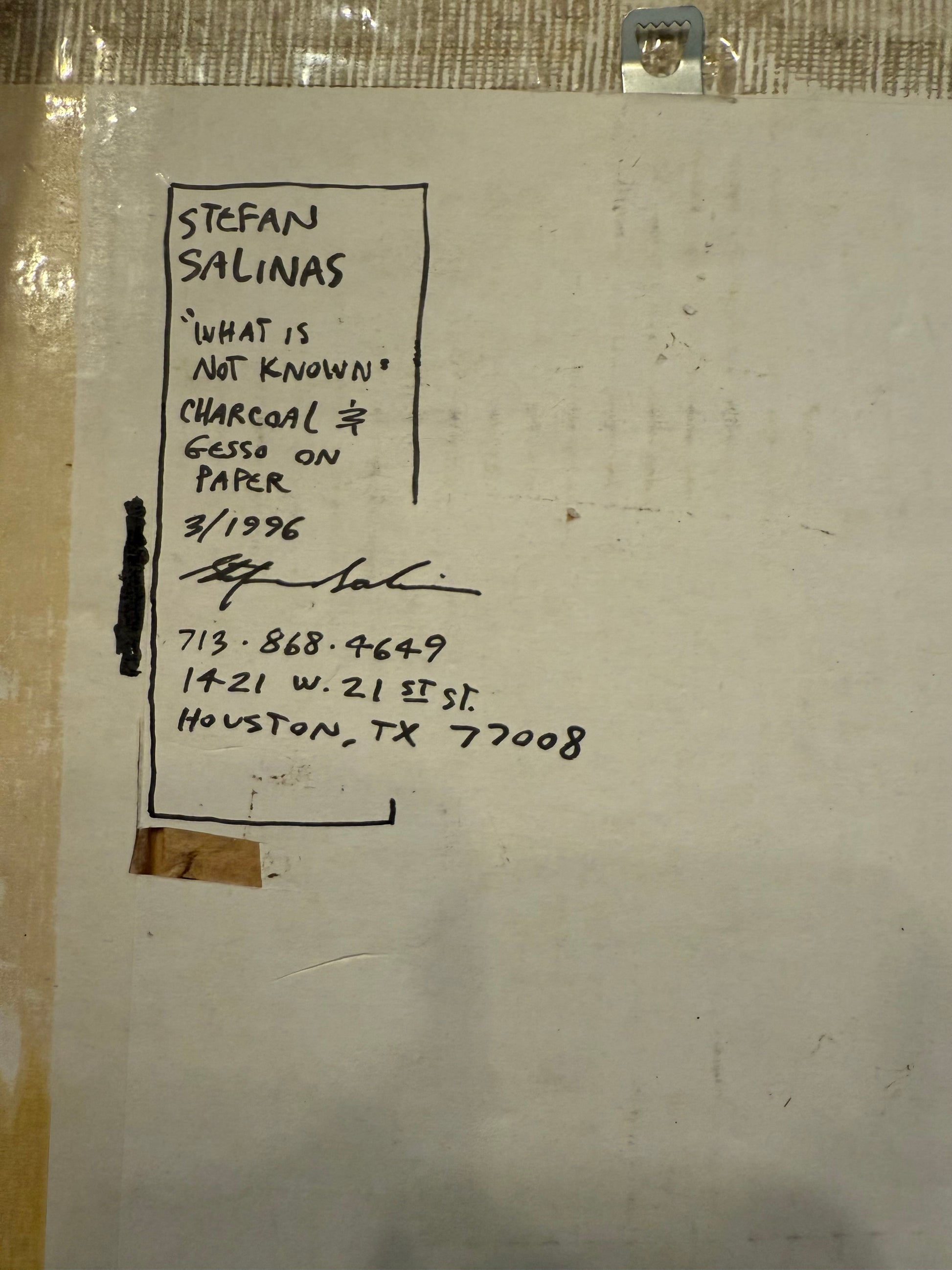 Artwork with text on a textured surface