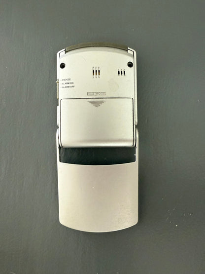 Brookstone Digital Travel Alarm Clock with a Flip-Up Cover