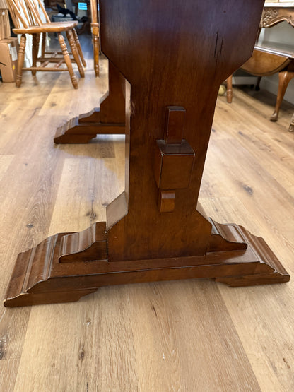 Wooden table legs on a wooden floor