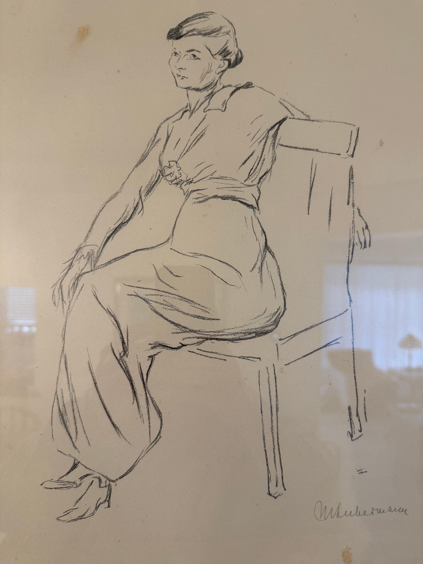 Sketch of a reclining figure on beige paper