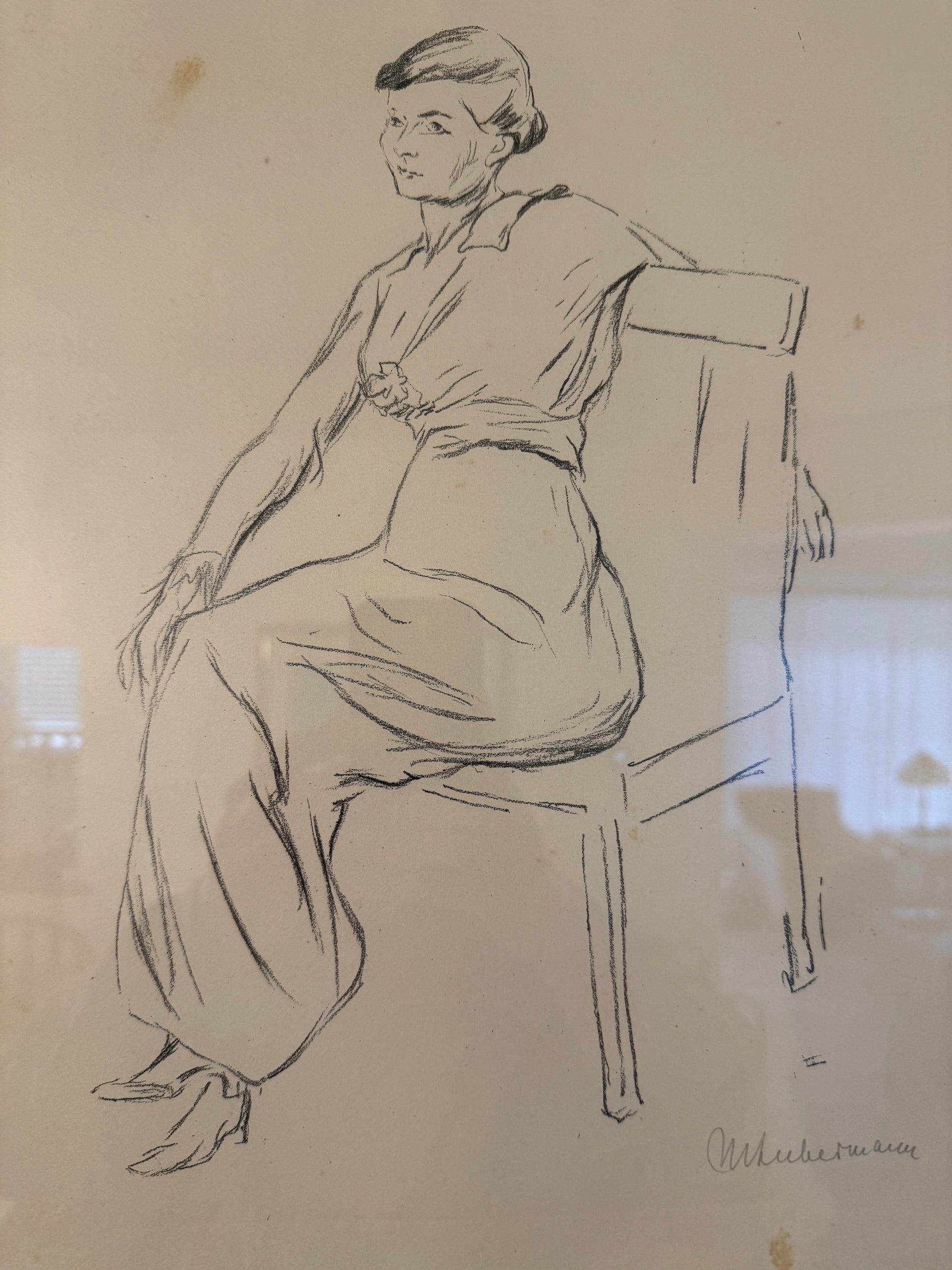 Sketch of a reclining figure on beige paper