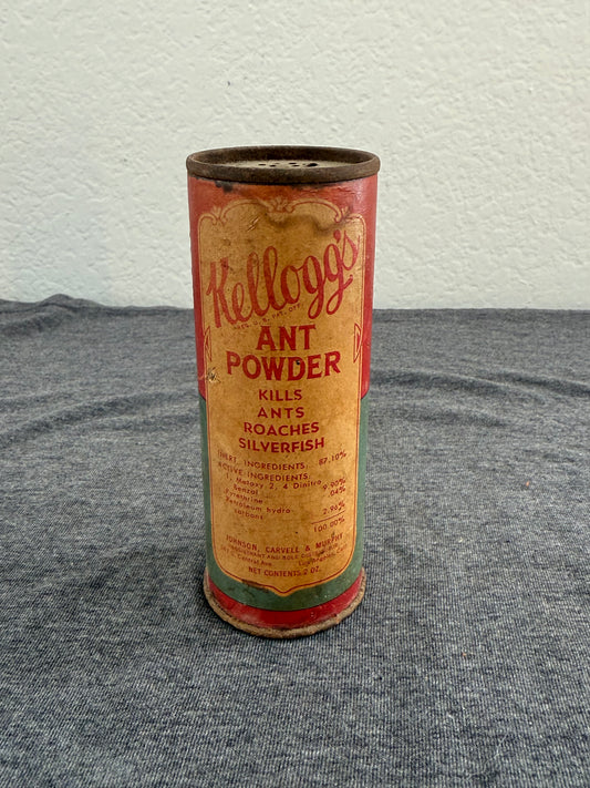 Vintage Kellogg's Ant Powder can on a gray and white background