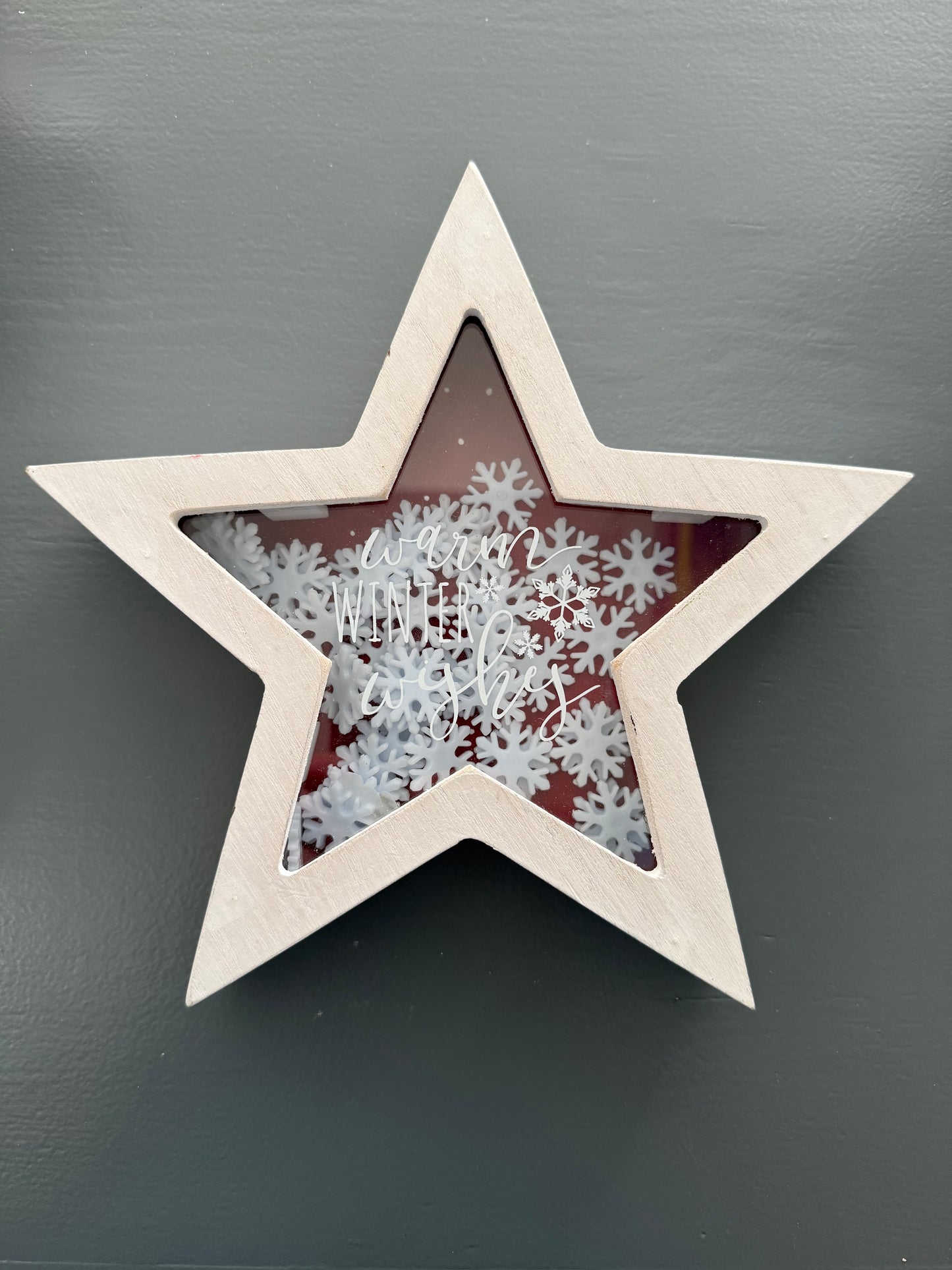 White Star Shaped Sign with Snowflakes and "Warm Winter Wishes" Text