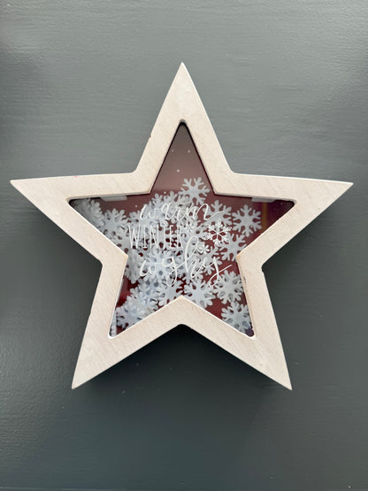 White Star Shaped Sign with Snowflakes and "Warm Winter Wishes" Text