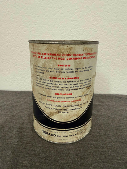 Close-up of a Texaco oil can label on a textured surface