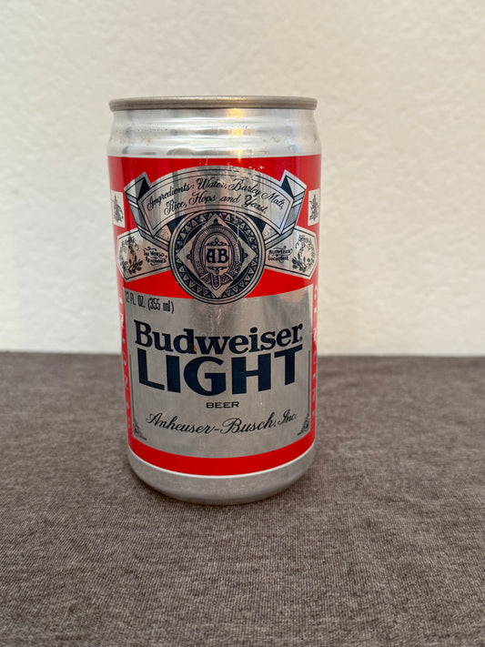 Budweiser Light beer can on a textured surface