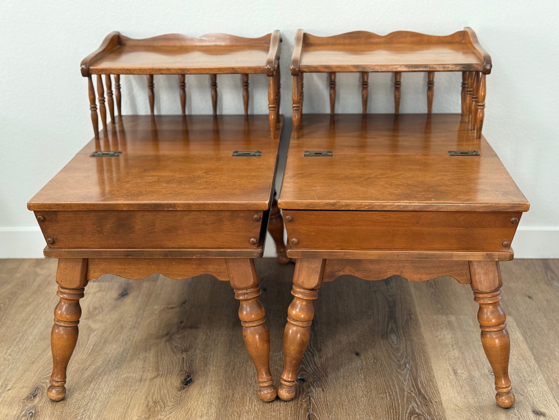 Pair of wooden side tables with a plain background