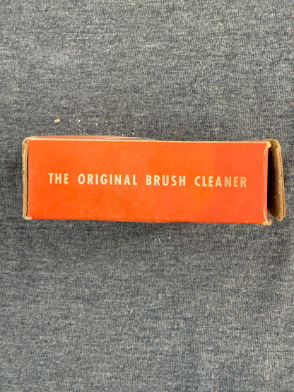 Vintage 'The Original Brush Cleaner' box on a gray background