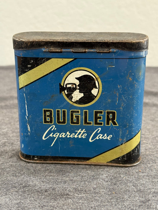 Vintage Bugler Cigarette Case on a textured surface
