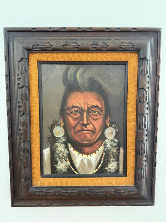 Framed portrait of a Native American Chief with decorative elements on a light gray background
