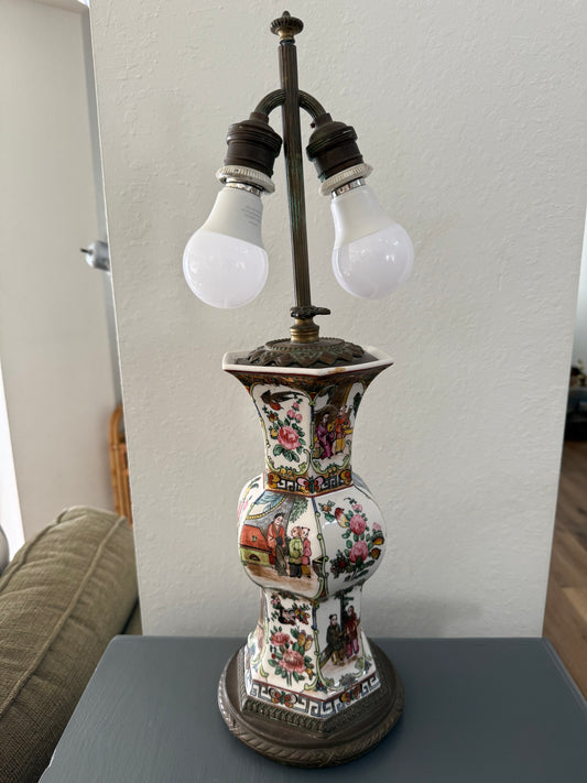 Decorative lamp with floral patterns on a white surface