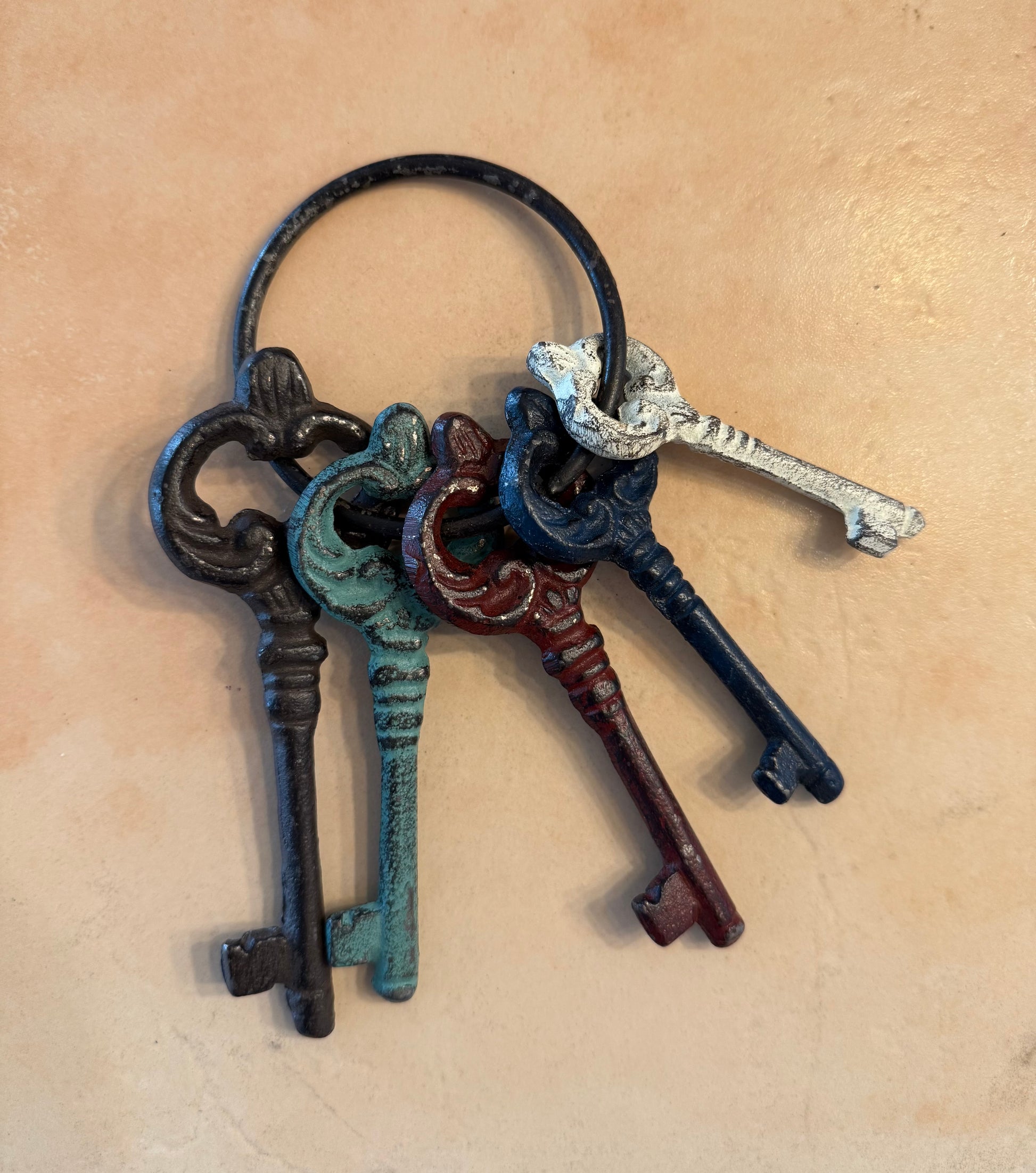 Set of decorative keys on a beige background