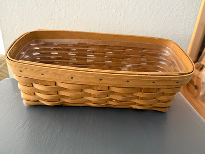 Woven brown basket on a gray surface with a neutral background