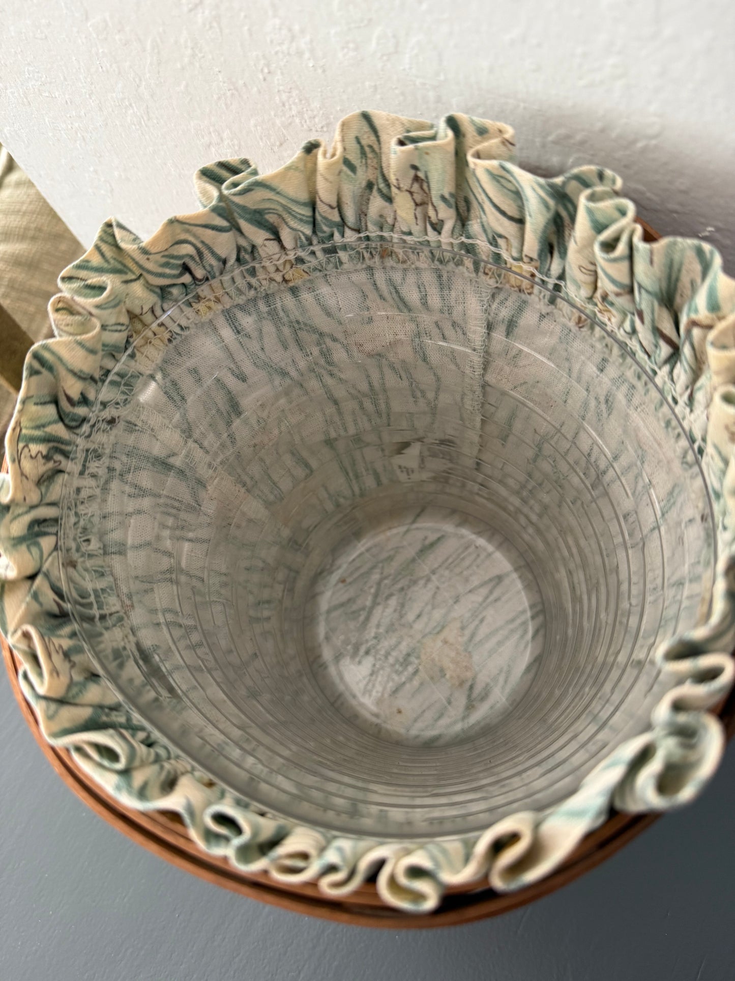 Decorative ceramic bowl with intricate designs on a neutral background