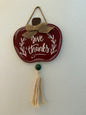Hanging Pumpkin Shaped Wood Sign with "Give Thanks" Lettering