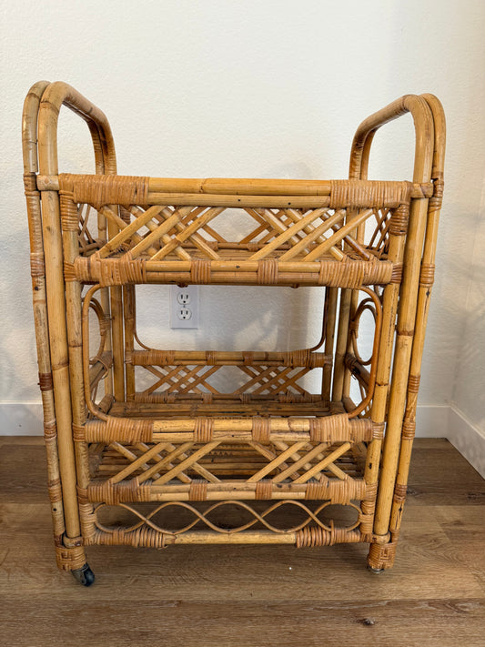 Woven rattan cart against a wall